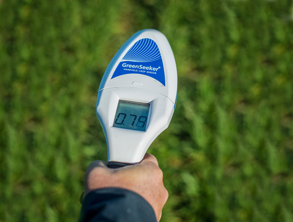 Brent Rendel, farmer in the Northeast area of Oklahoma near Miami Ok shares how he uses the Greenseeker technology and the new hand held scanner recently released to measure nutrient needs of his crops.  He demonstrates the device as used to measure nitrogen needs of his wheat field.  multiple measurements are used comparing a N-Rich Strip to the rest of the field and nitrogen is added at a rate to maximize growth potential and minimize over fertilization.